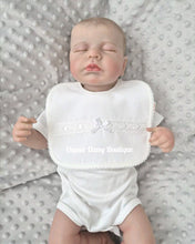 Load image into Gallery viewer, Spanish Baby Bib Ribbon Slot