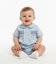 Load image into Gallery viewer, Baby boy in powder blue romper - professional