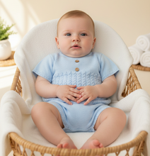 Load image into Gallery viewer, Baby boy in rattan bassinet