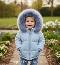 Load image into Gallery viewer, Baby boy standing in blue puffer jacket outdoors