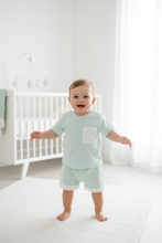 Load image into Gallery viewer, Baby boy standing in nursery