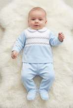 Load image into Gallery viewer, Baby boy wearing the pale blue outfit on a white fluffy rug