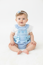 Load image into Gallery viewer, Baby girl in blue romper
