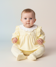 Load image into Gallery viewer, Baby girl in lemon yellow babygrow - sitting pose