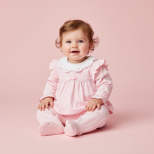 Load image into Gallery viewer, Baby girl in pink babygrow - sitting supported