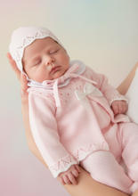 Load image into Gallery viewer, Baby girl in pink knitted set - cradled
