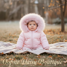 Load image into Gallery viewer, Baby girl in pink puffer jacket outdoors