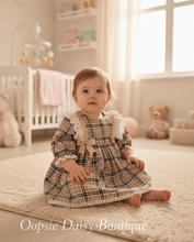 Load image into Gallery viewer, Baby girl in plaid dress with polka dot sleeves