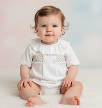 Load image into Gallery viewer, Baby girl in white romper - Legs out pastel