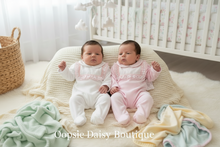 Load image into Gallery viewer, Baby girls in white and pink velour rompers