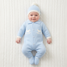 Load image into Gallery viewer, Baby in blue on a white cable-knit blanket