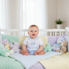 Load image into Gallery viewer, Baby in white crib