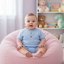 Load image into Gallery viewer, Baby on pink beanbag