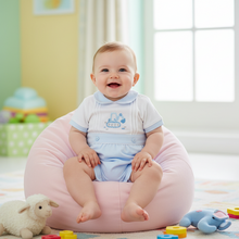 Load image into Gallery viewer, Baby on pink beanbag