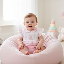 Load image into Gallery viewer, Baby on pink beanbag