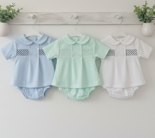Load image into Gallery viewer, Baby outfits on wall peg rail with plants