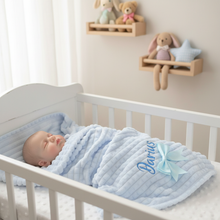 Load image into Gallery viewer, Baby resting on side with blanket in crib