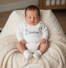 Load image into Gallery viewer, Baby sitting on white beanbag in white romper