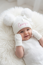 Load image into Gallery viewer, Baby wearing personalised white hat and matching mittens on a white rug