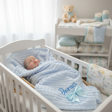 Load image into Gallery viewer, Baby with personalised blanket in crib close-up