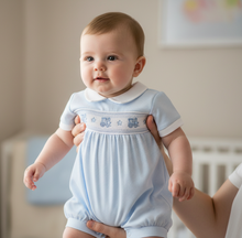Load image into Gallery viewer, Blue romper held