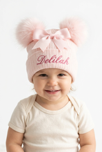 Load image into Gallery viewer, Close-up of toddler wearing the two-pom-pom pink hat