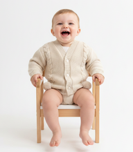 Load image into Gallery viewer, Cream cardigan laughing baby wooden chair