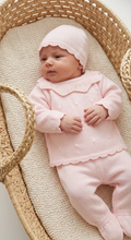 Load image into Gallery viewer, Diagonal side view of the Moses basket, baby with clasped hands