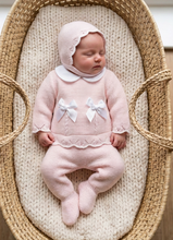 Load image into Gallery viewer, Lighter pink overhead version with a single bonnet chin strap
