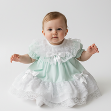 Load image into Gallery viewer, Mint dress hands out showing ribbons