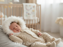 Load image into Gallery viewer, Newborn baby lying on beanbag wearing beige pramsuit