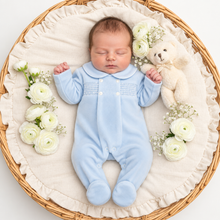 Load image into Gallery viewer, Newborn in blue velour smocked romper - variation 1
