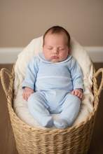 Load image into Gallery viewer, Newborn in seagrass basket, arms by sides