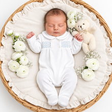 Load image into Gallery viewer, Newborn in white/blue velour smocked romper - variation 1