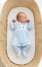 Load image into Gallery viewer, Overhead baby model in a wicker Moses basket