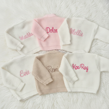 Load image into Gallery viewer, Overhead cardigans on white fluffy rug