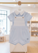 Load image into Gallery viewer, Pale blue romper in modern minimalist boutique