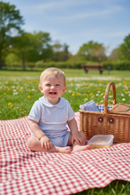 Load image into Gallery viewer, Sitting on picnic blanket