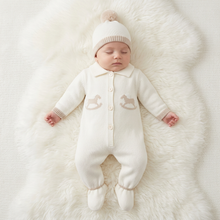 Load image into Gallery viewer, Sleeping baby in cream on a large white fluffy rug