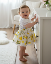 Load image into Gallery viewer, Standing at dresser with flowers