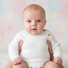 Load image into Gallery viewer, Supported sitting baby in white romper