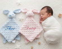 Load image into Gallery viewer, Three bunny comforters flat lay