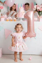 Load image into Gallery viewer, Toddler at first birthday party with number one balloon