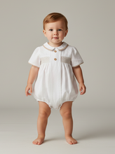Load image into Gallery viewer, Toddler boy standing in white romper - portrait