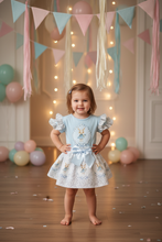 Load image into Gallery viewer, Toddler standing with pastel bunting decorations