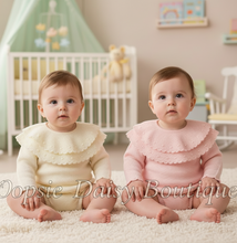 Load image into Gallery viewer, Two babies in cream and pink knitted outfits