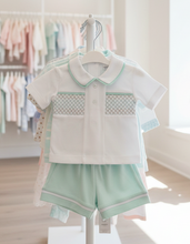 Load image into Gallery viewer, White and mint outfit on rail - sunlit
