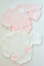 Load image into Gallery viewer, White outfit and matching bonnet brightened to clean white, with the pink ribbons and pink outfit preserved