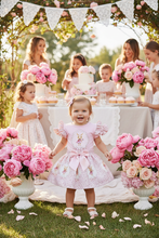 Load image into Gallery viewer, Young toddler at outdoor garden party with flowers