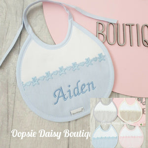 Personalised Spanish Round Bib With Teddy/Toys Towelling Back